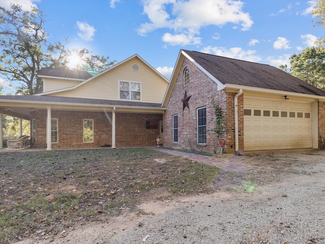 view of front of property with a garage