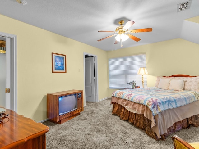 carpeted bedroom featuring ceiling fan and lofted ceiling