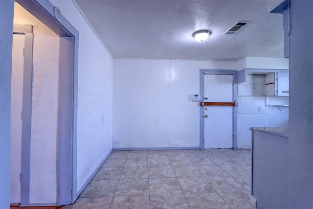 interior space with a textured ceiling