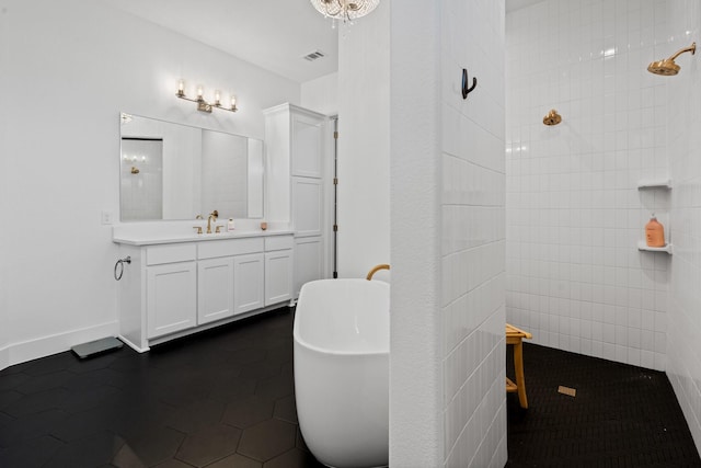 bathroom featuring vanity, shower with separate bathtub, and tile patterned flooring