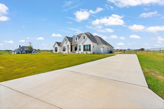 view of front of home with a front lawn