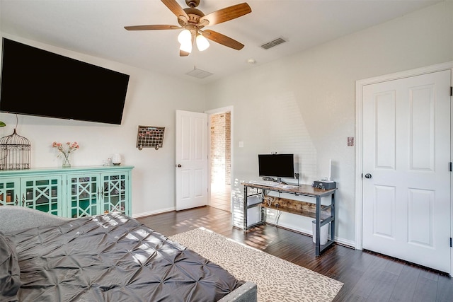 bedroom featuring dark wood-type flooring and ceiling fan