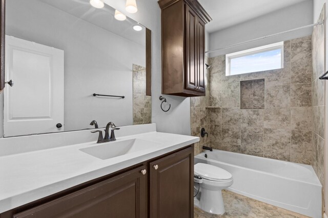 full bath featuring vanity, toilet, and shower / bathtub combination