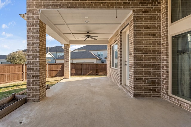 view of patio with ceiling fan and a fenced backyard