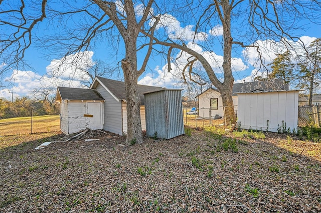 exterior space featuring a shed