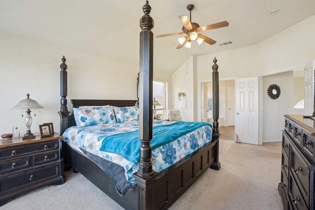 bedroom featuring vaulted ceiling, ceiling fan, and light colored carpet