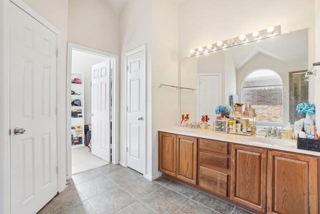 bathroom featuring tile patterned floors and vanity