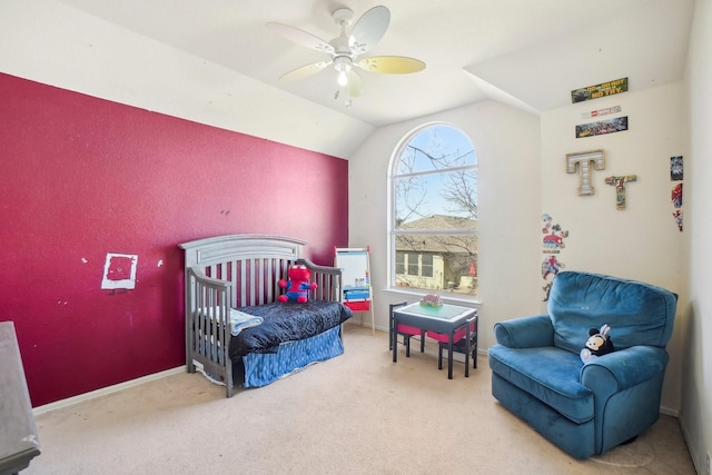 bedroom featuring vaulted ceiling, carpet floors, and ceiling fan