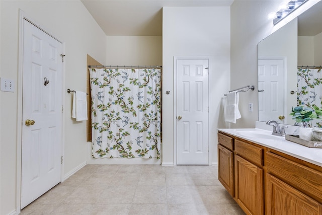 bathroom featuring vanity and shower / bath combination with curtain