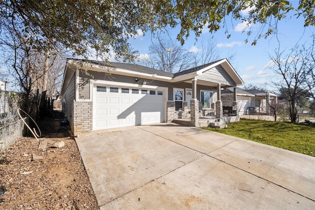 view of front of home featuring a garage, a porch, and a front lawn