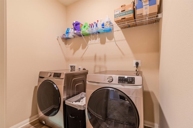 laundry area featuring separate washer and dryer