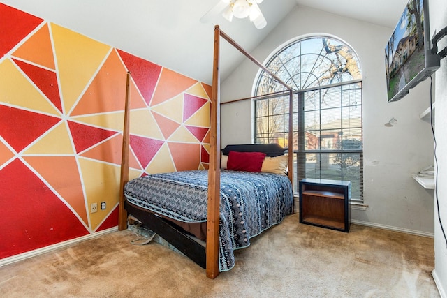 carpeted bedroom with high vaulted ceiling