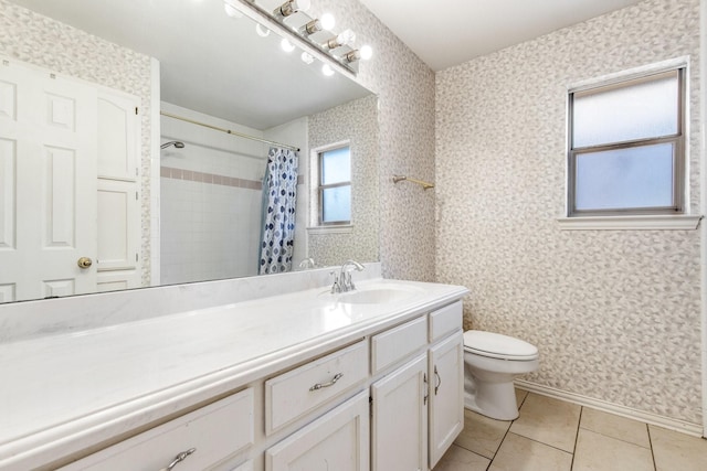 bathroom with vanity, curtained shower, tile patterned floors, and toilet