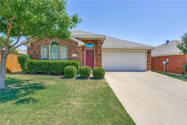 ranch-style house with a garage and a front yard