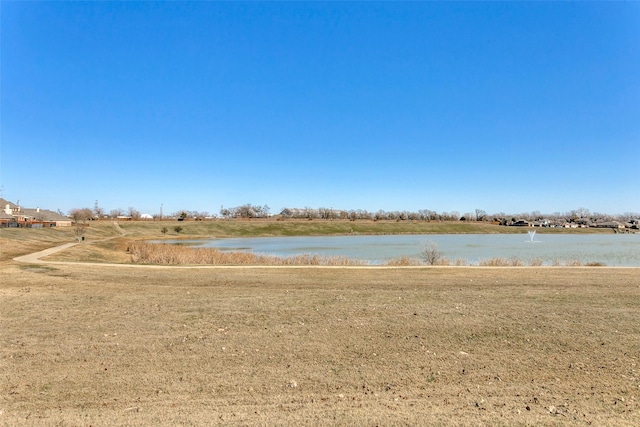 view of yard featuring a water view