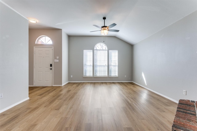 foyer entrance featuring ceiling fan, plenty of natural light, and light hardwood / wood-style flooring