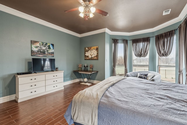 bedroom featuring ornamental molding and ceiling fan