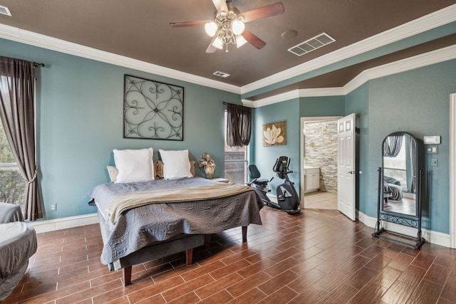 bedroom with crown molding, ceiling fan, and ensuite bath