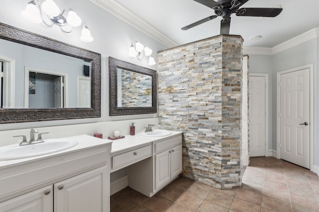 bathroom with vanity, crown molding, ceiling fan, and walk in shower