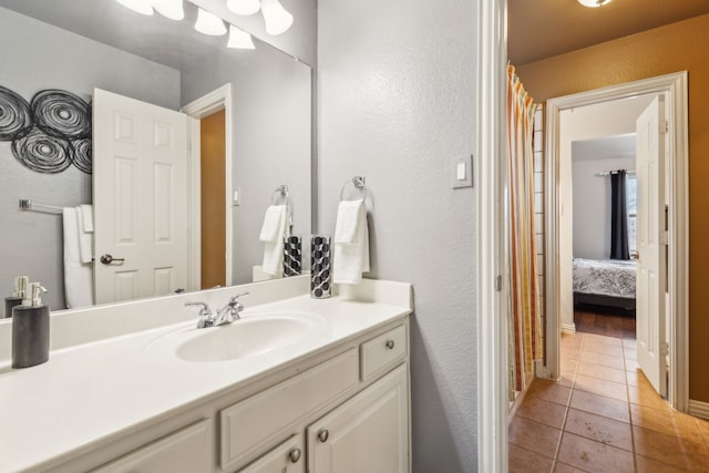 bathroom with vanity and tile patterned floors