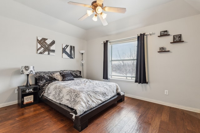 bedroom featuring dark hardwood / wood-style flooring and ceiling fan