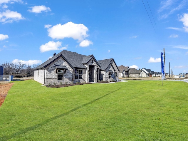 exterior space featuring a front lawn