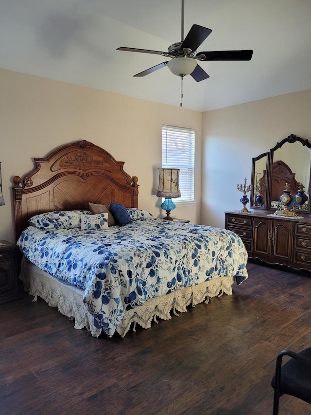 bedroom featuring ceiling fan and dark hardwood / wood-style floors