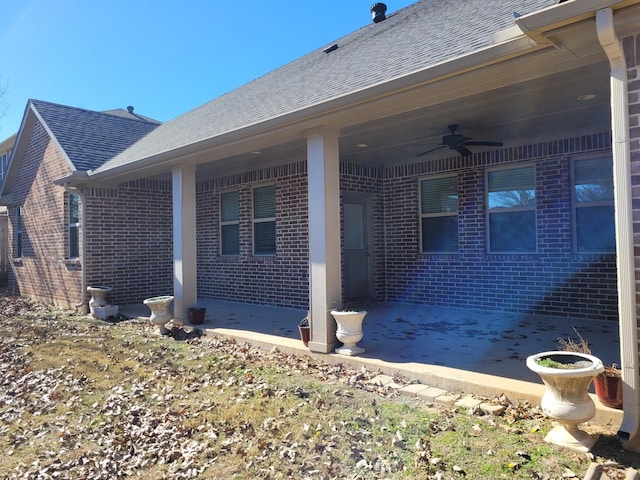 view of property exterior with ceiling fan