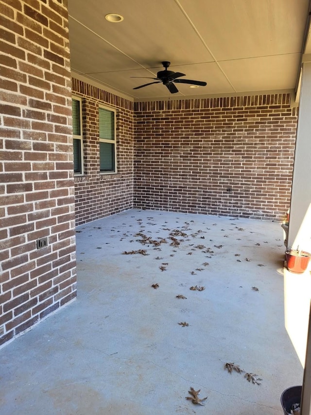 view of patio featuring ceiling fan