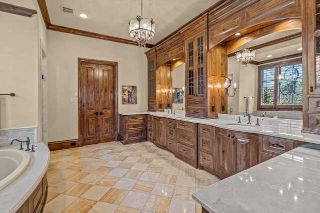 bathroom with ornamental molding, vanity, a bathtub, and a notable chandelier