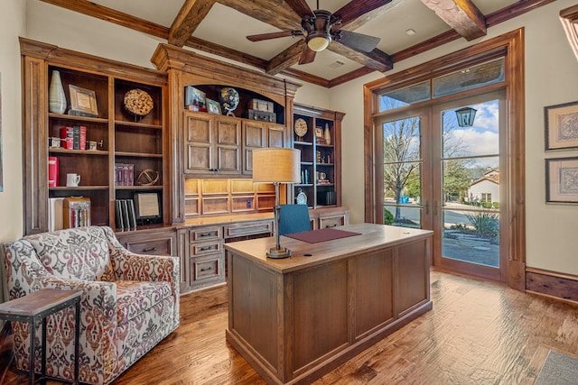 office space featuring coffered ceiling, beam ceiling, light hardwood / wood-style floors, and french doors