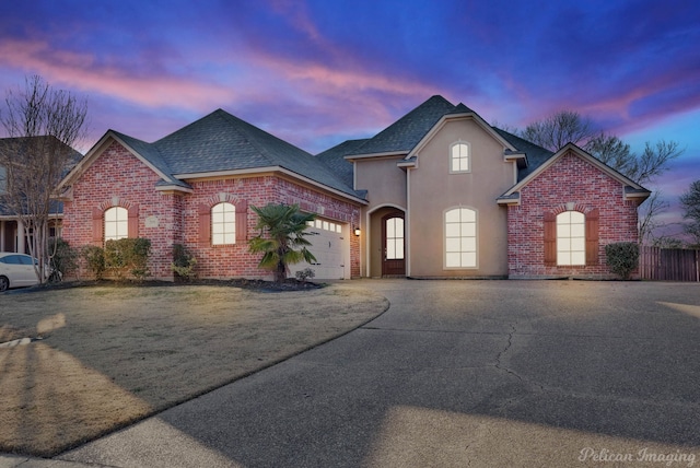 front facade with a garage