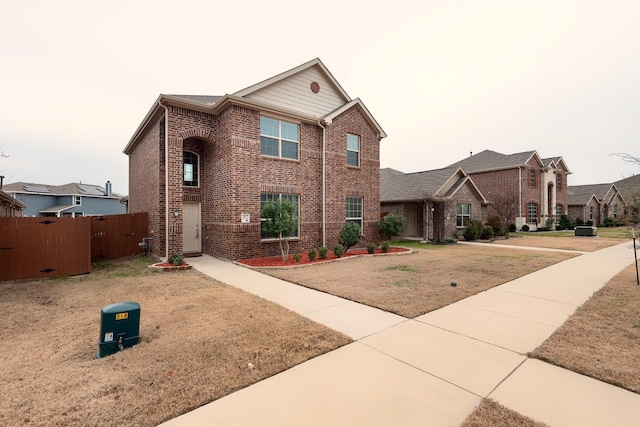 front facade with a front yard