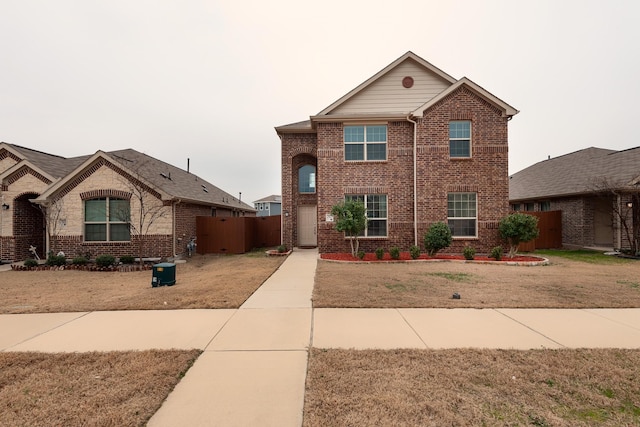 view of front of home with a front lawn