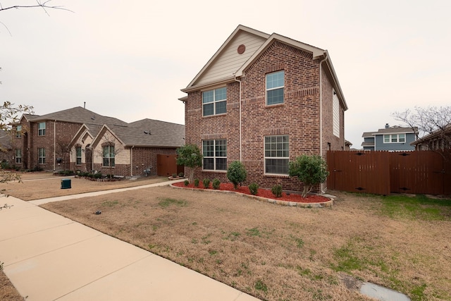 view of front of property featuring a front lawn