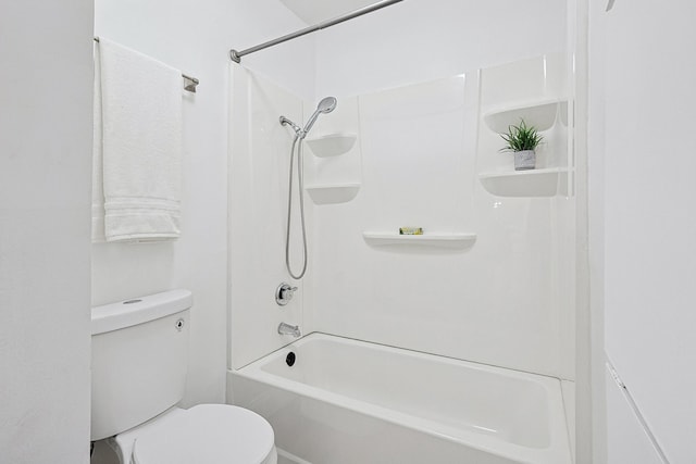 bathroom with shower / bathtub combination and toilet