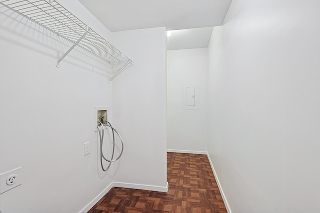 washroom featuring hookup for a washing machine and dark parquet flooring