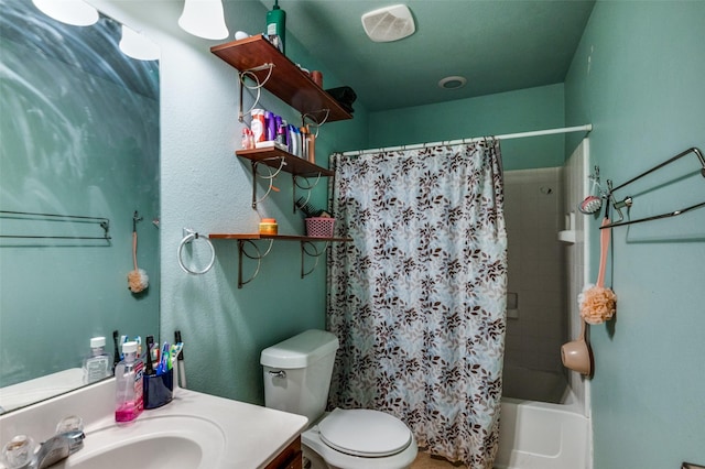 full bathroom featuring vanity, toilet, and shower / bath combo with shower curtain