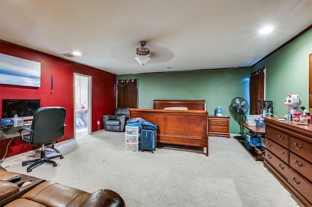 bedroom featuring crown molding, ceiling fan, connected bathroom, and light carpet