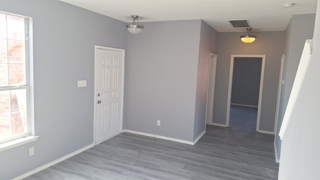 entrance foyer featuring dark hardwood / wood-style flooring