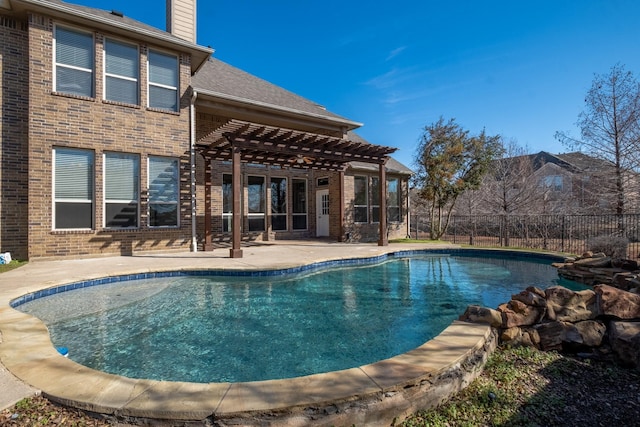 view of pool with a patio area and a pergola