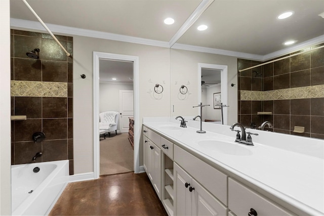 bathroom with vanity, ornamental molding, concrete floors, and tiled shower / bath