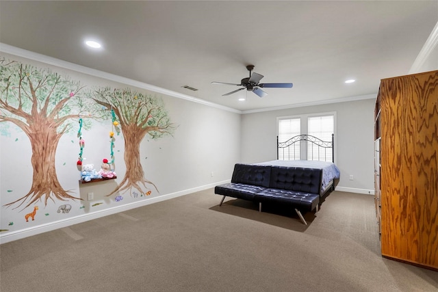 carpeted bedroom featuring ceiling fan and ornamental molding