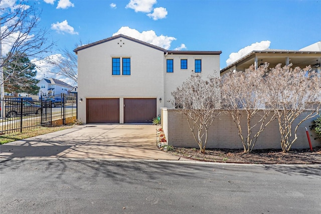 view of front of home with a garage