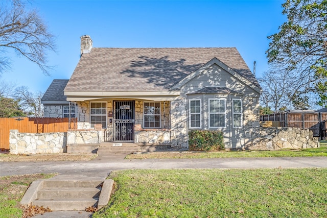 view of front of property featuring covered porch