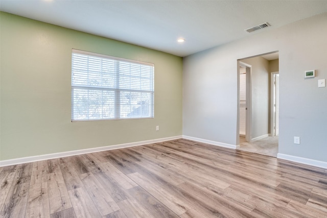 empty room featuring light hardwood / wood-style floors