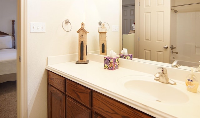 bathroom featuring shower / bathing tub combination and vanity