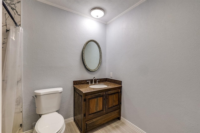 bathroom featuring crown molding, vanity, toilet, and wood-type flooring