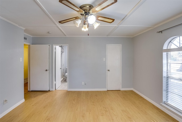 empty room with light hardwood / wood-style floors and ceiling fan