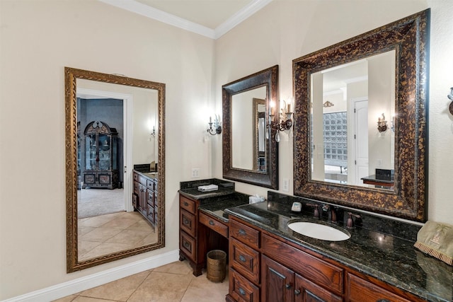 bathroom with tile patterned floors, ornamental molding, and vanity